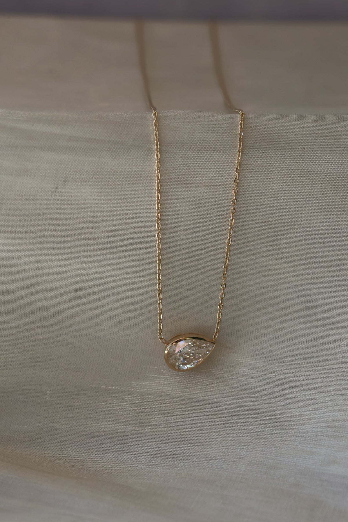 2 CT Tilted Pear Lab Diamond Bezel Necklace in 14K Yellow Gold | Penn Diamonds